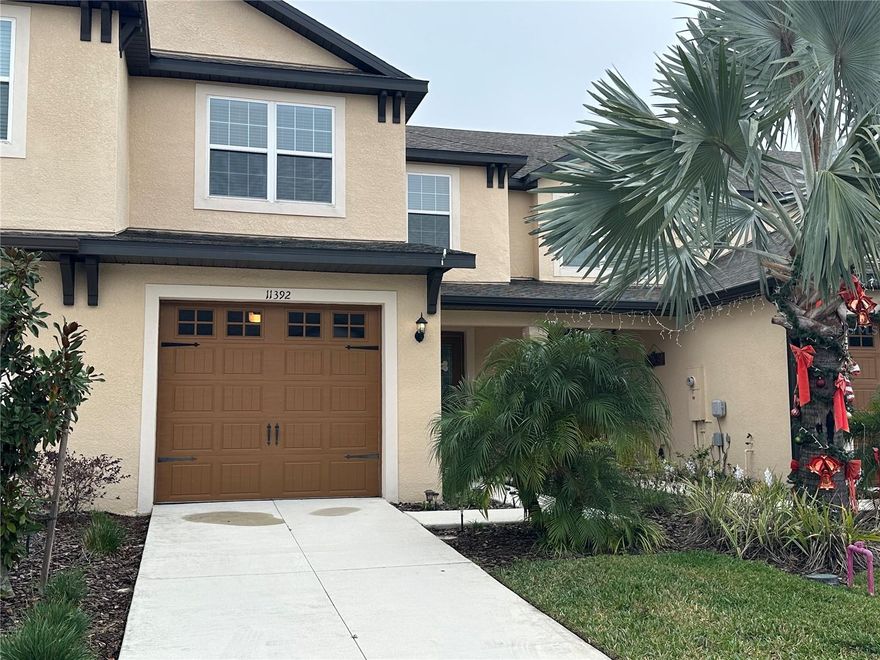 Come see this beautiful two-story 3/2.5/1 townhome in Mirada, home of the largest man-made lagoon in the USA! This stunning LGI Sorrento Model features a modern, open-concept layout with beautiful luxury vinyl flooring throughout (no carpet except on the stairs!). The chefs' dream kitchen features all stainless-steel appliances, quartz countertops, tall wood cabinets, a large island workspace and spacious walk-in pantry. A spacious family room, dining area, and guest bath completes the first floor, along with a screened-in covered patio (no rear neighbors, perfect for morning coffee or afternoon happy hour!). Upstairs you'll find the primary bedroom with its large walk-in closet and luxurious en-suite bathroom featuring a double sink vanity, walk-in shower, and private water closet. Down the hall are two additional bedrooms, a full bathroom, and a laundry closet with sink. The Mirada amenities include the 15-acre crystal-clear man-made lagoon with sandy beaches, kayaking, paddle boarding, and resort-style amenities plus walking and biking trails, playgrounds, and dog parks. Conveniently located near I-75, this home offers easy access to Wesley Chapel, Tampa, and local shopping, dining, and medical facilities - close to everything but private and secure, call for your showing today! BTW, rent includes high-speed internet, lawn care, and of course, the nations largest man-made fresh water lagoon!!