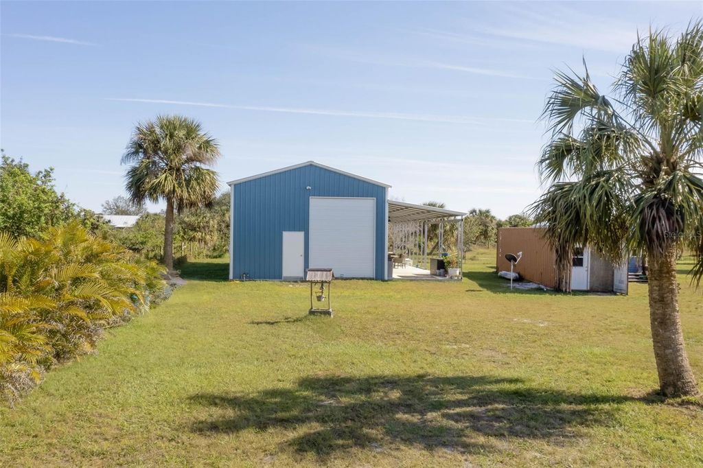 Photo of 7041 Swiss Boulevard, Punta Gorda, FL 33982 (MLS # C7502628)