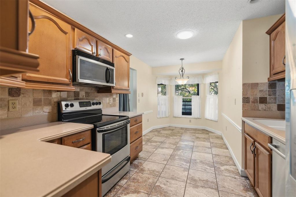 Photo of 21110 SW Plantation Street, Dunnellon, FL 34431 (MLS # OM716347)