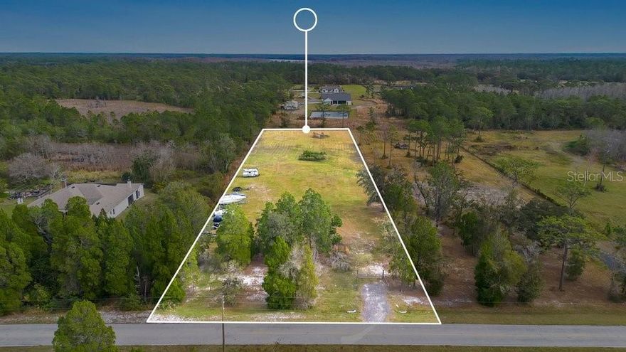 Vacant residential parcel spanning 2.29 acres of high and dry land, located on a quiet dead-end street for added privacy. The fully fenced property offers a peaceful setting with ample space to design and build your custom home. The parcel is not located in a flood zone! Nearby public access to Lake Gentry provides the perfect opportunity to enjoy boating, fishing, and outdoor recreation. Ideally situated near Highway 192 and Narcoossee Road, with the State Road 515 Northeast Connector Expressway planned nearby, adding long-term growth potential. Great opportunity to build your dream home in a growing area!