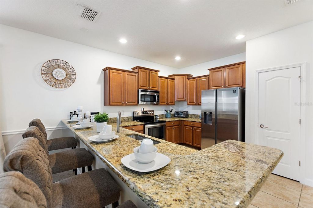 Photo of 1464 Moon Valley Drive, Davenport, FL 33896 (MLS # S5142568)