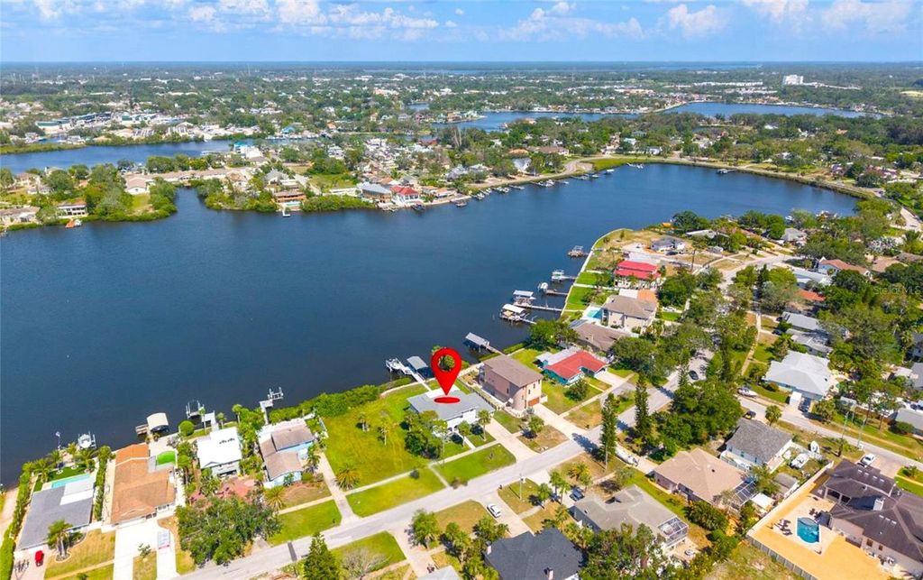 Photo of 644 Bayshore Drive, Tarpon Springs, FL 34689 (MLS # TB8472569)