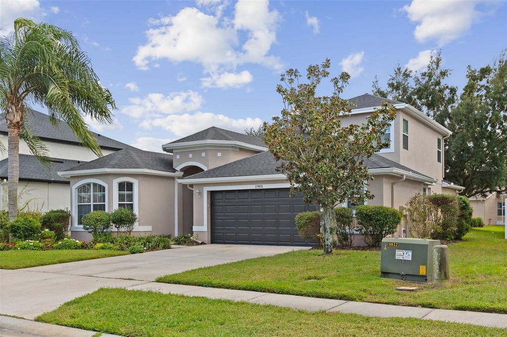 Photo of 27426 Silver Thatch Drive, Wesley Chapel, FL 33544 (MLS # TB8562133)