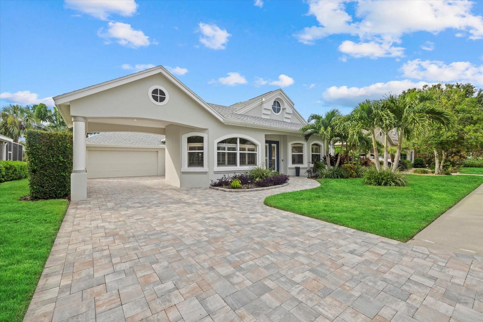 Contemporary Waterfront Elegance in Bradenton’s Premier Boating Enclave:
Experience the pinnacle of modern coastal living at 4611 Shark Drive—an exceptional waterfront estate nestled within one of Bradenton’s most sought-after boating communities. Positioned on a wide saltwater canal with 75 feet of frontage and direct Gulf access—no lifts, no locks—this residence presents a rare blend of architectural sophistication, high-end finishes, and effortless nautical lifestyle.
Completely reimagined, this four-bedroom, three-bath home embodies a refined coastal aesthetic with clean lines, abundant natural light, and an open-concept layout ideal for both relaxed living and elevated entertaining. At the heart of the home lies a custom-designed chef’s kitchen (2024), featuring striking quartz countertops, a dramatic dual-sided island with integrated electronic hub, and an expansive walk-in pantry tailored to the gourmet enthusiast.
Throughout the home, 4’ x 4’ designer ceramic tile flooring, upgraded cabinetry, and 7¼-inch baseboards offer a sense of refined continuity. Luxurious bath renovations include quartz surfaces, elegant vanities, and TOTO bidet toilets, transforming everyday routines into spa-like experiences. Custom California Closets further elevate the interiors with sleek, built-in organization designed for a discerning lifestyle.
Step outside to a private oasis designed for waterfront enjoyment. A 2024 composite dock—featuring integrated cable handrails and a cool-touch, splinter-free surface—extends the living space to the water’s edge. The 10,000-lb covered boat lift with 36’ x 13’ canopy accommodates a variety of vessels, offering seamless access to the open waters of the Manatee River and beyond.
Additional upgrades include a new HVAC system (2023), pool pump and filter (2024), and a roof installed in 2017. Exterior enhancements such as elegant paver walkways, a widened six-foot paver driveway with gentle ramp, and a resort-style pool within a screened lanai complete this exceptional offering. The generous backyard provides ample room for future expansion or personalization.
With its bespoke finishes, prime waterfront location, and unparalleled access to the Gulf, 4611 Shark Drive is a rare opportunity for the boating enthusiast who seeks both style and substance—without compromise.