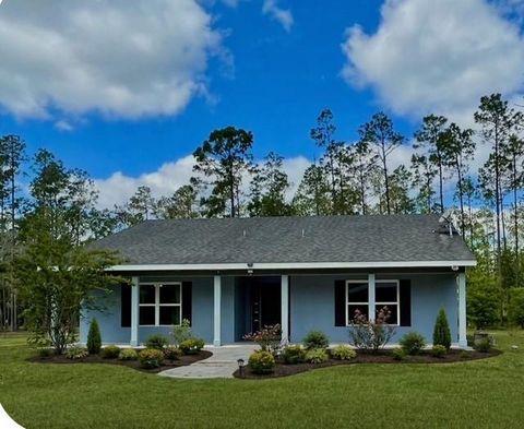 Photo of 6100 Winning Wood Trail, De Leon Springs, FL 32130 (MLS # O6363085)
