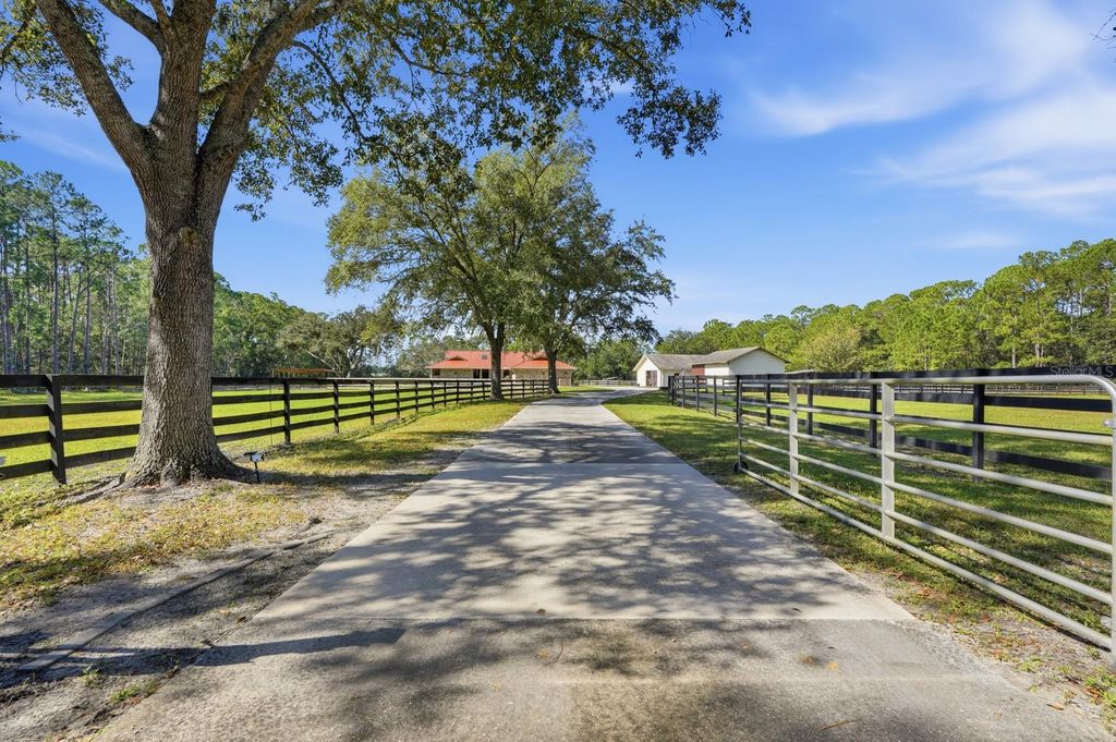 Photo of 460 Spring Forest Drive, New Smyrna Beach, FL 32168 (MLS # V4945841)