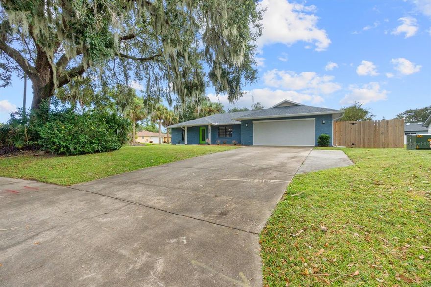 Don't miss this fabulous family home on a beautiful corner lot in a subdivision with NO HOA DUES and AWESOME UPDATES! This 3 bedroom, 2 bath beauty is loaded with lovable updates like a NEW ROOF (2022), skylight, gutters, soffits, garage screen, and fresh exterior paint. Here, your family will enjoy a fabulous open floorplan that's perfect for family living and entertaining with large formal and informal living and dining areas with beautiful tile floors and fresh paint throughout. Enjoy added outdoor living space with a spacious screened Florida room overlooking the large private backyard with lush landscaping and NEW fencing. There’s also great backyard shed with NEW ROOF, paint, and tie-downs offering extra storage for your beach and garden gear. When night falls, the family can settle in with a smile thanks to the 3 spacious bedrooms, 2 beautifully UPDATED baths, and plenty of great closet space. Other great features here include UPDATED laundry room with NEW washer and dryer and all NEW lights, ceiling fans, and window blinds throughout. And your family will love this home’s fantastic central location near great beaches, parks, restaurants, shopping, and entertainment options. This is it. The ONE. Mountains of amazing new memories await your family here. Schedule your showing today!