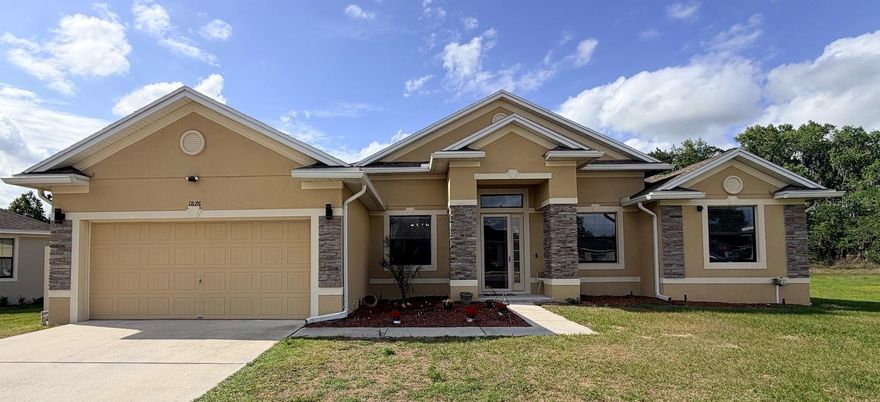1876 Creeks Vista Blvd | Lakeland, FL 33810
4 Bed | 2 Bath | Over 1/3 Acre | $100K+ in Upgrades | Creeks Crossing East

The best lot in Creeks Crossing East. Just come see it to believe it as it is not even close.

Over a third of an acre, pie-shaped, widening dramatically toward the rear with a sweeping view of a tranquil pond, towering mature hardwoods, and uninterrupted open space. No rear neighbors. No rooftops. Just open sky, still water, and old-growth trees with canopies that took decades to build. Beyond the property line, direct walking access to expansive open land leads to a man-made pond, wooded area, and freshwater creek. The kind of outdoor space that makes this feel like a private estate, not a subdivision. No other lot in the community comes close.

Over $100,000 in premium upgrades elevate this home well above anything else at this price point. Move-in ready. Nothing to fix, nothing to add.

INTERIORS

Sun-drenched open-concept layout with high ceilings and diagonal white marble porcelain tile flowing throughout the entire home that must be seen to be appreciated. This is designer-level installation laid on the diagonal, not builder-grade tile on a grid. The gourmet kitchen features top-tier granite with rich movement and depth, 42-inch cabinetry with decorative crown molding, and a full stainless steel appliance package. Premium granite continues throughout every surface in the home. Four generously sized bedrooms and two full bathrooms deliver the kind of space and finish that newer production builds simply do not offer.

UPGRADES

Gas line for dryer, stove, and exterior tankless water heater hookup. Yield faster cook times, lower utility costs, and precise heat control most Florida homes lack entirely.

60-amp Level 2 EV charging station Plug, hardwired and ready for today's electric vehicles and tomorrow's. One of the most sought-after features on the market and a genuine differentiator at this price point.

Modern LED lighting throughout. Clean white-tone interior fixtures, exterior wall sconces, and architectural soffit and eave accent lighting that gives this home a custom-built glow after dark.

THE LOT

Over a third of an acre. Pie-shaped. Direct sightline across open water, mature trees, and preserved open space. The privacy is absolute. The view is permanent. No future construction will ever block it. The towering hardwoods that frame the rear are not new plantings. They were here long before the neighborhood, and they will be here long after. No amount of landscaping money can replicate what nature took decades to build. Beyond the property line, accessible open land extends into a wooded natural area, effectively expanding usable outdoor space well beyond the survey. This is a backyard built for living, whether that means weekend gatherings, morning coffee at sunrise, or simply having the space to breathe.

LOCATION

Kathleen corridor of Lakeland. Direct access to I-4, US-98, SR-33, and US-92. Minutes to shopping, dining, and medical. Positioned between Tampa and Orlando without the price tag of either.

THE BOTTOM LINE

Similar sized homes in this community recently sold between $505,000 and $555,000. This home delivers $100K+ in upgrades and the best lot in the subdivision at over a third of an acre.

This does not come around often. When it does, it does not last.

Schedule your private showing today.

1876 Creeks Vista Blvd | Lakeland, FL 33810 | Creeks Crossing East
