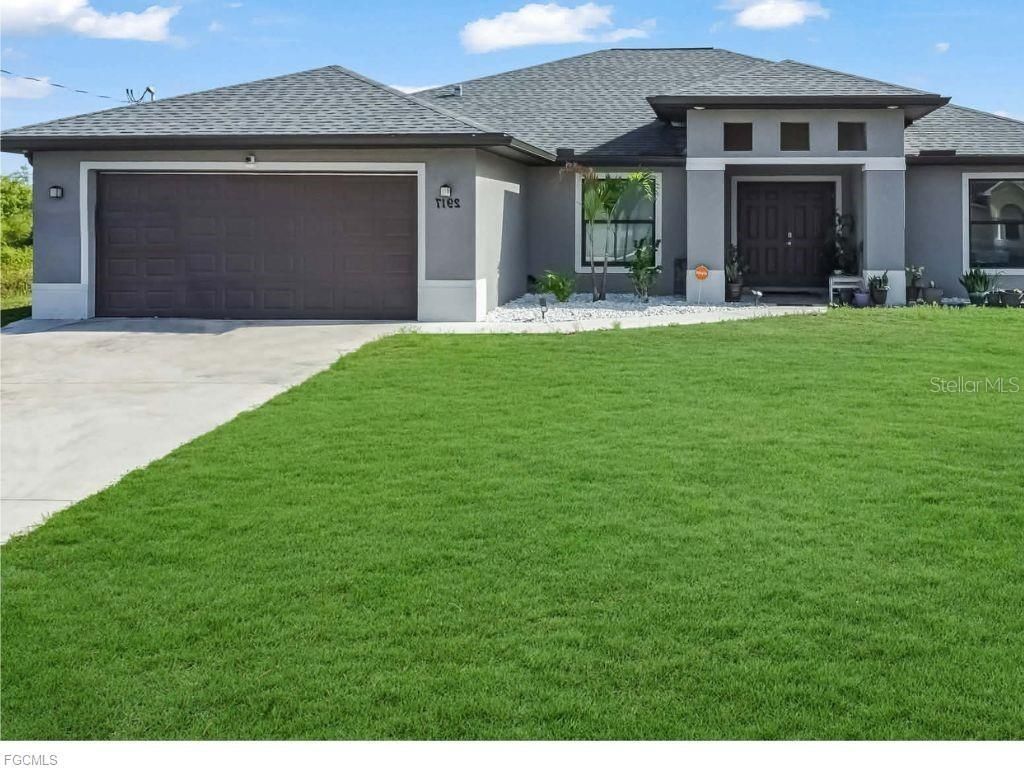 Photo of 2917 12th Street SW, Lehigh Acres, FL 33976 (MLS # C7524360)