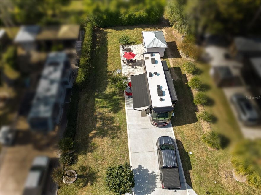 Welcome to this incredible RV resort where lifestyle and flexibility come together—you can enjoy this property year-round or seasonally in a truly resort-style setting. This private, well-situated RV lot is just minutes from fantastic dining, scenic state parks, and all the area’s top attractions, while also offering beautiful river views within the community. The lot includes a convenient outdoor storage shed with electricity, perfect for tools, hobbies, or extra storage. The HOA provides lawn care for the lot and common areas, water, private sewer, and trash, along with access to a gated (no-guard) community featuring a clubhouse, library, fitness center, sauna, steam room, resort-style pool, hot tub, dog park, parks, and sidewalks. Whether you’re seeking a relaxing getaway or a low-maintenance RV lifestyle, this exceptional lot offers comfort, convenience, and resort-style living at its best.