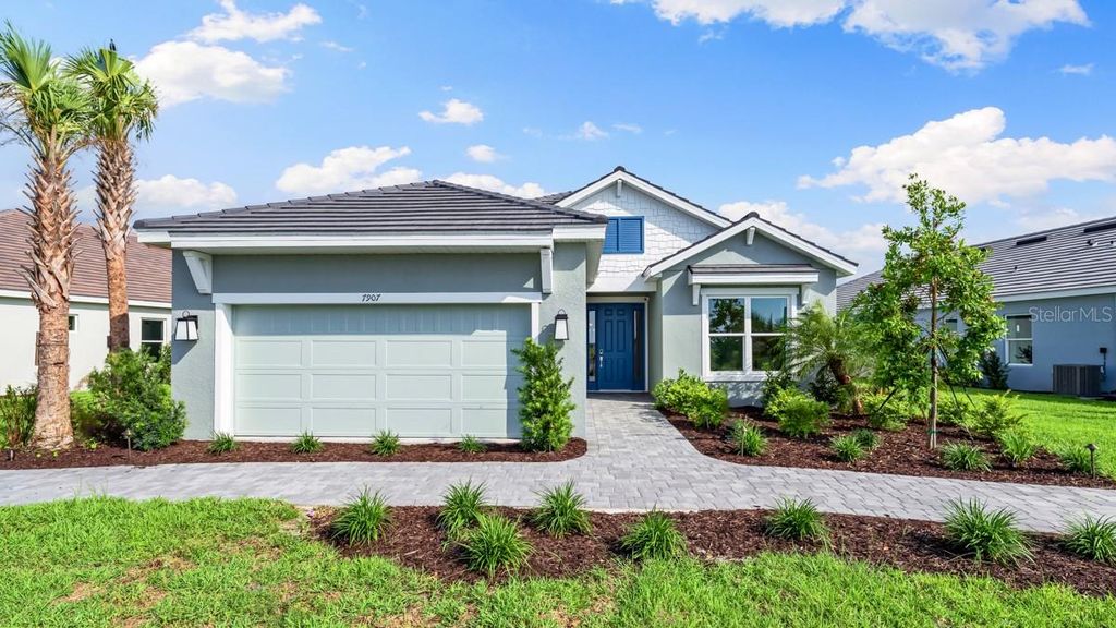 Photo of 7907 Coral Sea Lane, Palmetto, FL 34221 (MLS # TB8425984)