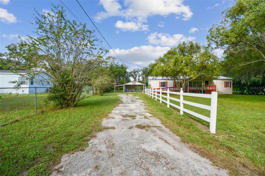 Photo of 18818 Holly Pine Trail, Lithia, FL 33547 (MLS # TB8436398)