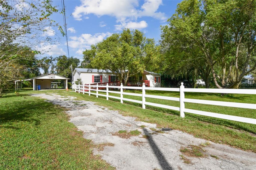 Photo of 18818 Holly Pine Trail, Lithia, FL 33547 (MLS # TB8436398)