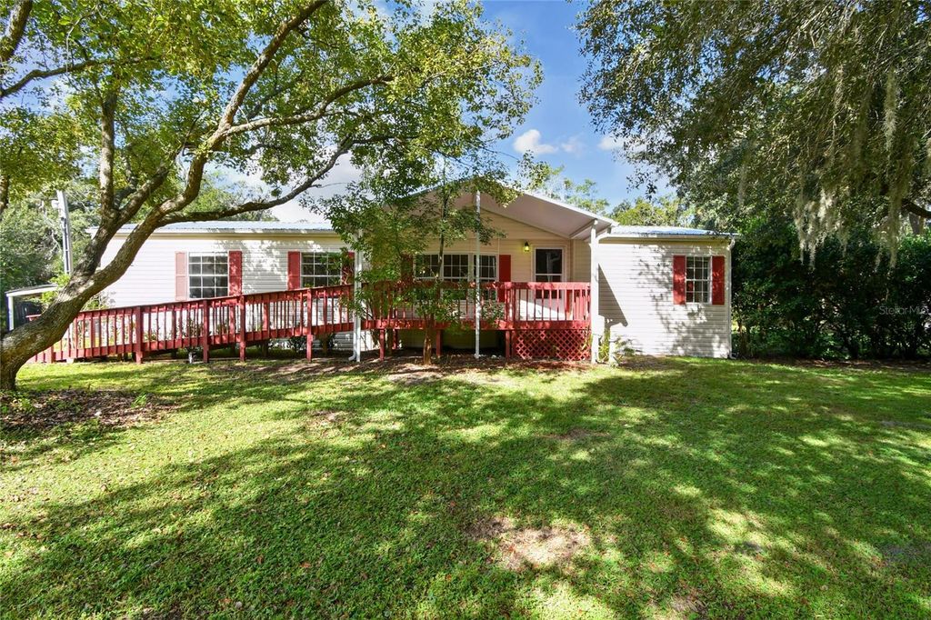 Photo of 18818 Holly Pine Trail, Lithia, FL 33547 (MLS # TB8436398)