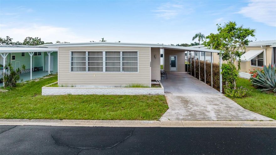 Welcome home to 3220 Sweet Gum Terrace located in Oakwood Manor, a gated 55+ community located in Sarasota, FL where you enjoy all that SWFL has to offer. This home is the perfect winter retreat, full time home or investment opportunity. Interior floor plan includes two bedrooms, two bathrooms, kitchen, dining room, living room and interior laundry for added convenience. On the exterior you'll love having the long driveway, carport and 48sq ft storage shed. Short distance to all the community has to offer including swimming pool, hot tub, shuffleboard, mini golf, fitness center and clubhouse. Home being sold partially furnished as shown, no golf cart. Perfect opportunity to renovate and make it yours. Short driving distance to restaurants, shopping, golf courses, beaches, airport and more.