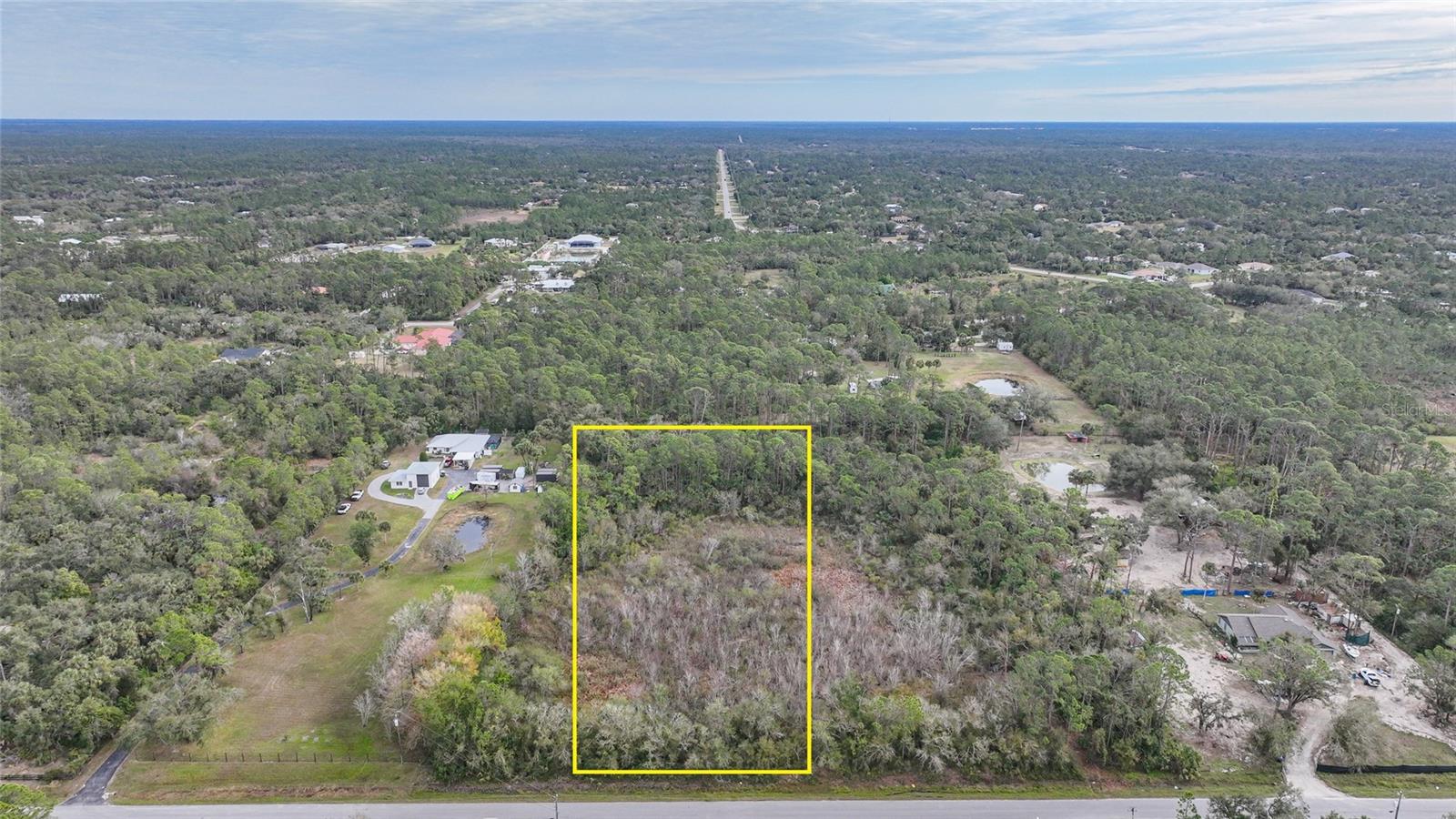Here is your opportunity to own an oversized lot to build your dream home conveniently located between Tampa and Fort Myers on Florida’s west coast. On over 3 acres of land in the highly desirable North Port Estates, there is plenty of room to build a large home with a pool and still have space for a detached garage/workshop and storage space for a boat or RV. There are no deed restrictions here so you can build your dream home just as you see fit. This lot has an ideal location with many newer homes in the vicinity. SIt offers easy access to top-rated schools, as well as miles of hiking and biking trails. North Port is home to the aquatic park and the Atlanta Braves Spring Training Center and is conveniently located with shopping and dining nearby, fishing, golfing, three airports offering commercial flights are located within an hour’s drive, and some of Southwest Florida’s #1 beaches in the US! Close to I-75. Best of all, there are no HOA fees, CDD, or flood insurance required for this property, giving you the freedom to enjoy your slice of paradise without any additional expenses. Don't miss this opportunity to make this one-of-a-kind custom home in Southwest Florida your own!