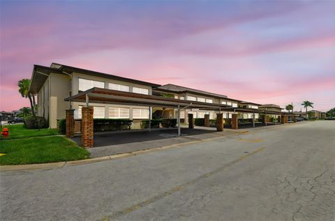 Photo of 5111 Amulet Drive #104, New Port Richey, FL 34652 (MLS # TB8412804)