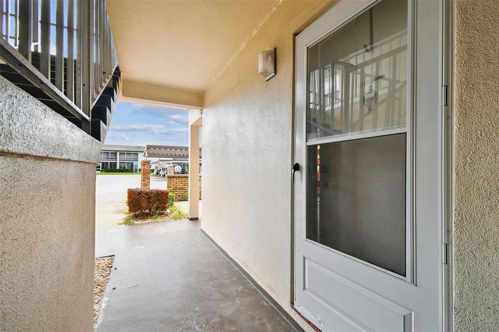 Photo of 5111 Amulet Drive #104, New Port Richey, FL 34652 (MLS # TB8412804)