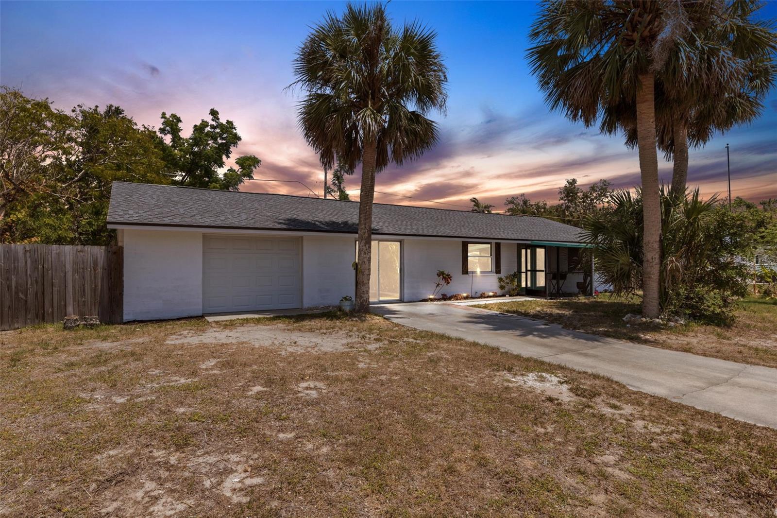 NON-DEED RESTRICTED, NON-FLOOD ZONE HOME ON 0VER 10,000 SQUARE FOOT LOT!! BOATS, TRAILERS, MOTOR HOMES WELCOME. THREE MILES TO THE BEACH AND LESS THAN SEVEN MILES TO CASEY KEY BOAT LAUNCH. Superior location not only to these previously noted destinations but also to some of the best waterfront hang outs for dining and fun in Sarasota such as Nokomos, Dockside, and Pop’s Sunset Grill. This home, with 3 Bed/ 2 Bath, has a spacious covered screened lanai and sizable fenced rear yard where you can create a wondrous retreat for family and friends to enjoy- even offers space for a pool if that suits your pleasure. The front of this home provides ample parking whether for auto, RV, boat, work trailers, or any other equipment or recreational toys. New are the roof and water heater and newer are the updated baths, AC, garage door, double glass front doors and most windows. According to the previous listing the septic tank and field were newly installed in approx. 2019- seller had tank pumped 2024. This home is connected to public water. The one car garage could be 2-car tandem, but currently shows as a 1-car with workshop. One block over is a Merkle Park with shuffleboard and kids play equipment. Under 2 miles to the Legacy Trail. You gotta check it out!