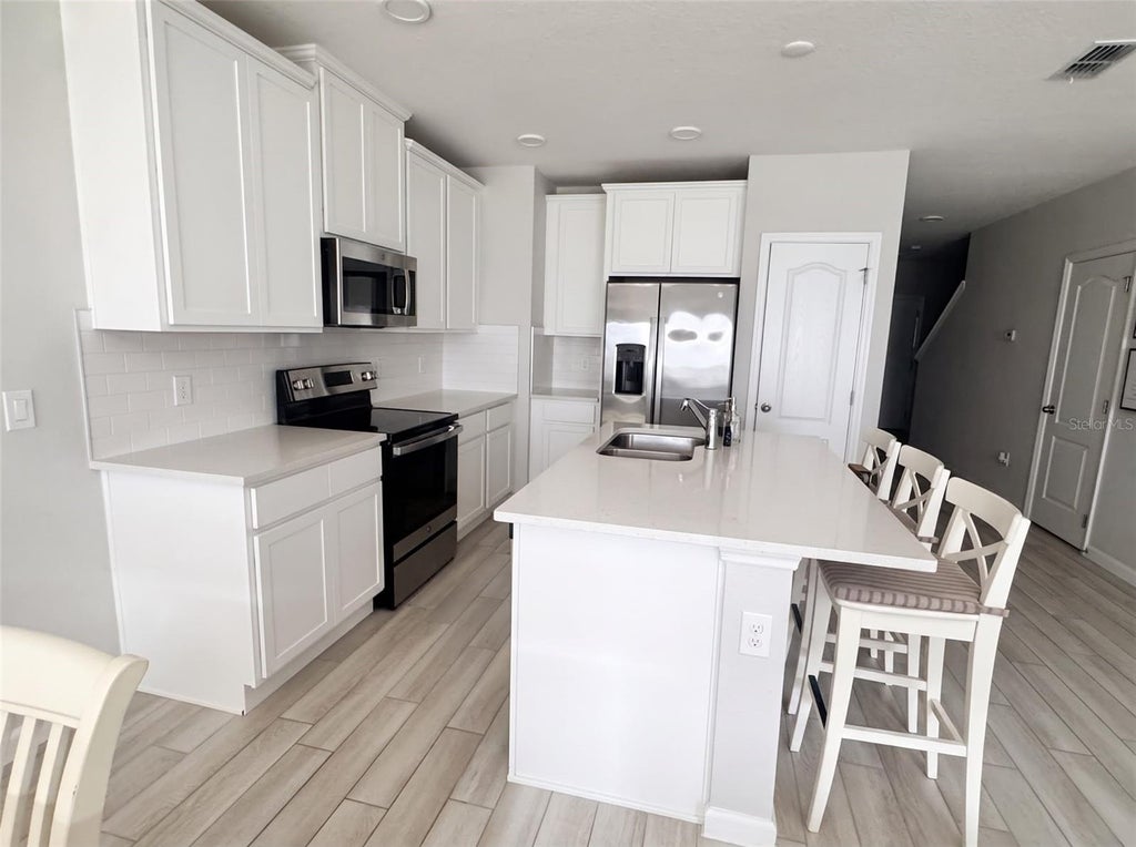 Photo of 14917 Harvest Street, Orlando, FL 32824 (MLS # O6435532)