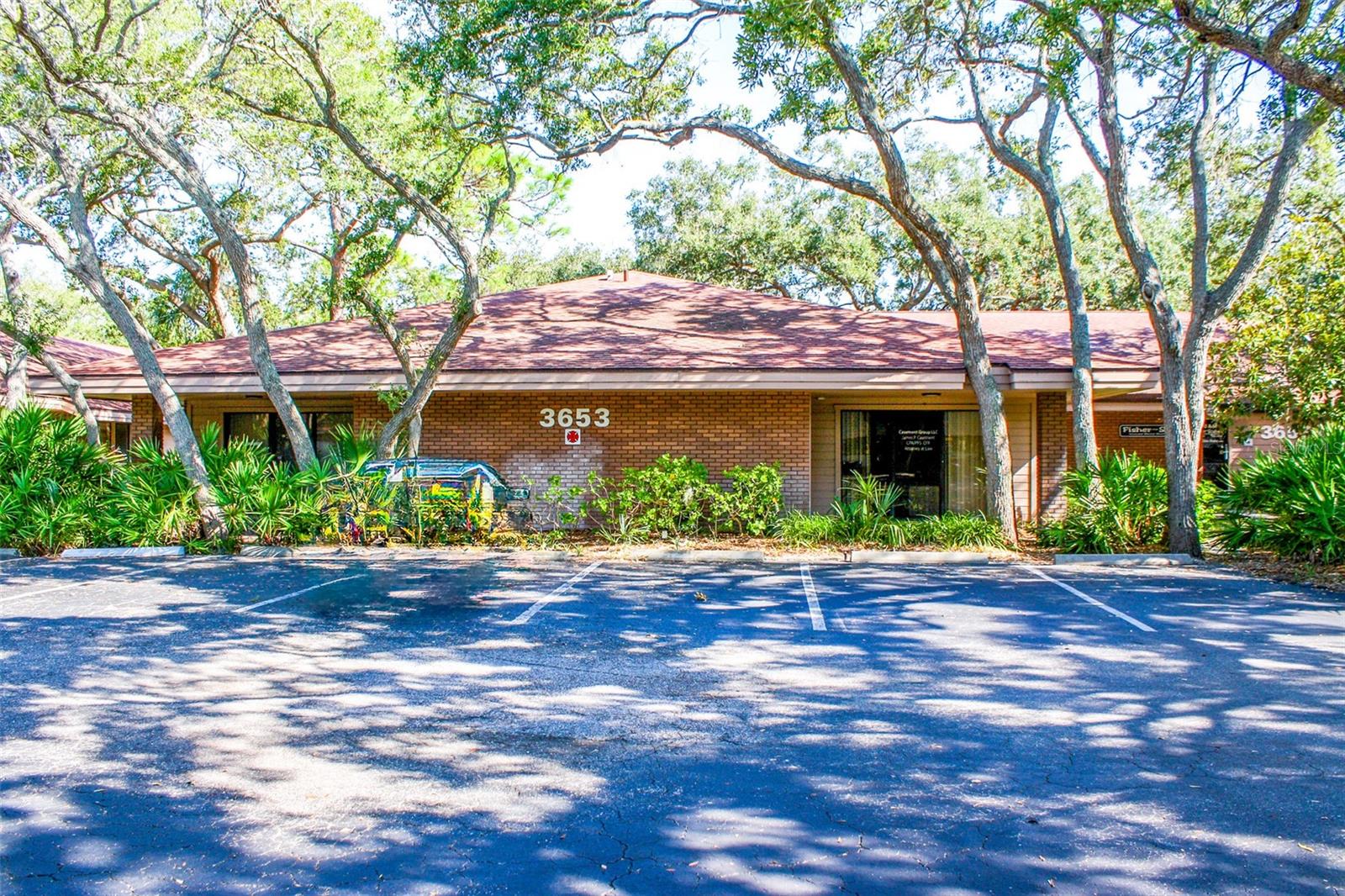 PRICE REDUCED! Great investment opportunity to acquire a partially leased freestanding office building within the beautiful Wildewood Office Park on Cortez Road in Bradenton, Florida. Three suites comprising 1,692 +/- square feet are currently leased to three different tenants, leaving a fourth separate 4,070 +/- square feet (Suite 110) for the new owner to occupy.
This new owner's space features 11 offices, a large conference room, small conference room, lobby area, kitchen/breakroom, storage rooms, and men's and women's restrooms with two stalls in each. The separate entrances around the building allow for the other tenants of the leased suites to not interfere with the business operating out of the new owner's suite. Buy your business a home and stop paying rent. Possible Seller Financing Available to Qualified Buyers!
This building is one of twelve professional office buildings situated on almost 13 Acres, in a project called Wildewood Professional Park located on the busy Cortez Road corridor in Bradenton, Florida. An Owner's Association has been set up to handle cross access easements, shared retention, landscape maintenance, signage, and entrance features allowing these buildings to be owned independently. This is not a condominium association. The building owners own their buildings and their land with restrictions that support attractive appearance and appropriate usage.