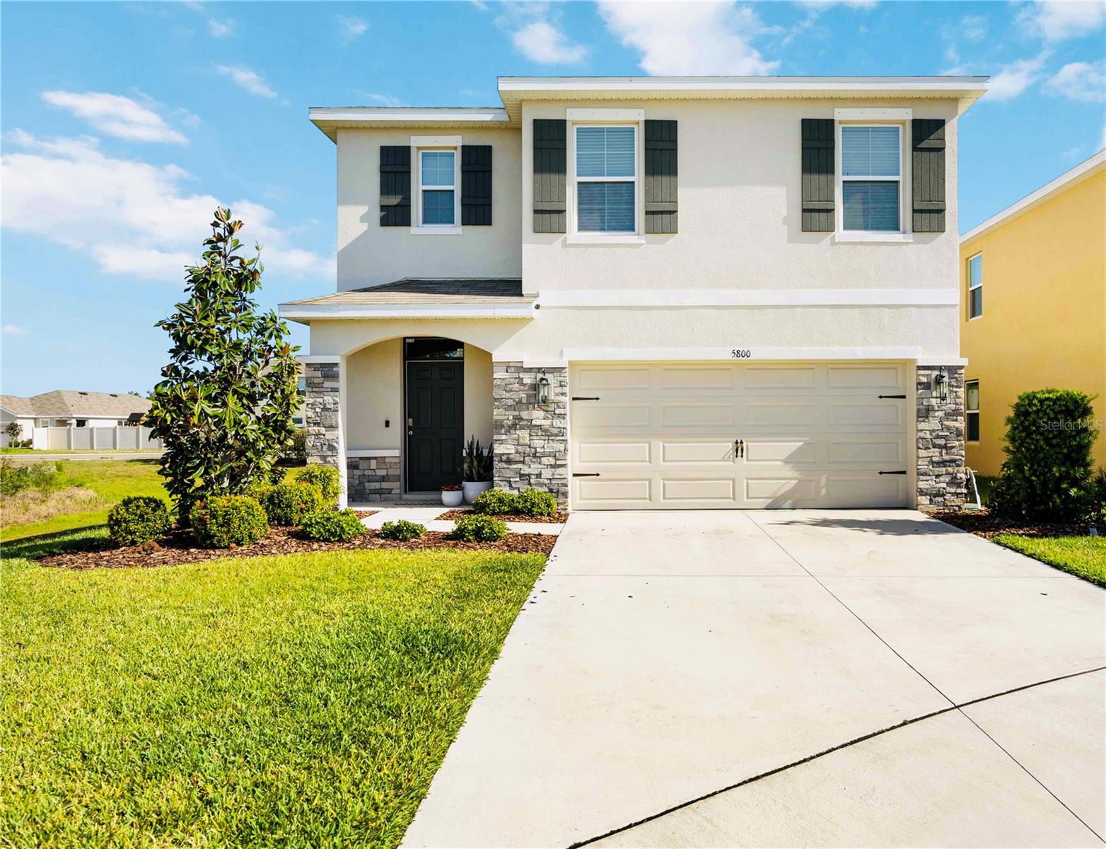 Stunning all block two-story, five-bedroom, three-bathroom POOL home is perfectly situated on an oversized cul-de-sac street on an end lot, offering privacy and picturesque nature preserve views from every window.
Step inside to an open-concept main floor designed for modern living and effortless entertaining. The stylish kitchen features quartz countertops, a spacious island, stainless steel appliances, and a generous walk-in pantry—seamlessly flowing into the bright and inviting living and dining areas. The living room is anchored by a custom mantle with a sleek electric fireplace, adding warmth and contemporary charm.
Also on the main level is a full bedroom and bathroom—ideal for guests, a home office, or a playroom.
Step out to your private backyard oasis, complete with a brand-new HEATED pool, new lanai cage, pavered patio, covered roof extension, lush tropical landscaping, and a 6-foot privacy fence. This space offers the perfect blend of comfort and style for year-round outdoor living.
Upstairs, a spacious landing leads to the luxurious owner’s suite, featuring a walk-in closet and an ensuite bath with dual vanities, a walk-in shower, and a linen closet. Three additional generously sized bedrooms share a well-appointed full bathroom with double sinks and a tub/shower combo. A convenient upstairs laundry room and multiple storage closets round out this thoughtfully designed home.
Don’t miss the chance to own this exceptional property in one of the area’s most desirable communities— GATED COMMUNITY / located in the Sarasota High School District and just minutes from Sarasota Christian and Cardinal Mooney High School. LOW HOA / NOT IN A FLOOD ZONE
Schedule your showing TODAY!