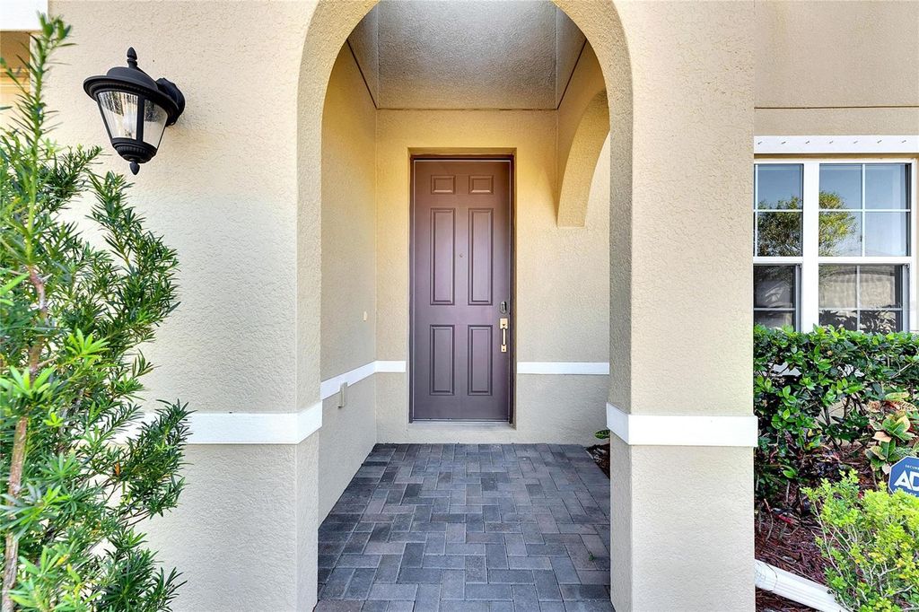 Photo of 1192 Multiflora Loop, Lutz, FL 33558 (MLS # TB8406500)