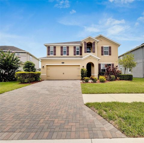 Photo of 1192 Multiflora Loop, Lutz, FL 33558 (MLS # TB8406500)
