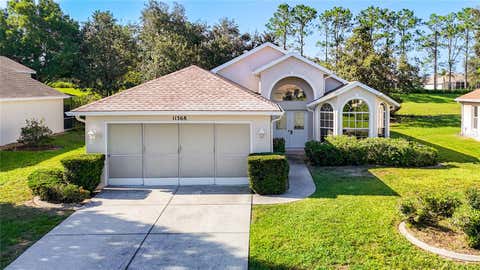 Photo of 11368 Leeds Drive, Spring Hill, FL 34609 (MLS # TB8538620)