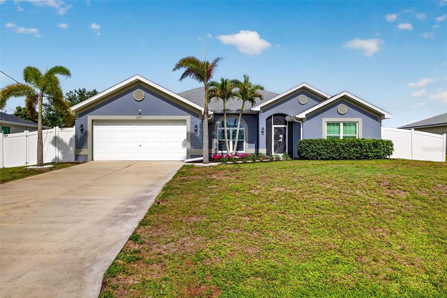This spacious 4-bedroom, 2 full bath all-electric home is perfectly situated in a prime location in the heart of Cape Coral, offering easy access to Fort Myers, beautiful beaches, shopping, dining, and entertainment. Designed for both entertaining and everyday living, the open and inviting layout creates the perfect balance of comfort and privacy. The home features numerous updates completed in 2023, including a new roof, new impact windows and fresh interior and exterior paint. The bright and airy living spaces with stylish tile and vinyl flooring throughout flow seamlessly, making gatherings with family and friends effortless. Step outside to enjoy the private fenced backyard, ideal for relaxing, entertaining, or enjoying your morning coffee on the screened lanai after a long day. This move-in ready home combines modern updates, spacious living, and an unbeatable Cape Coral location.