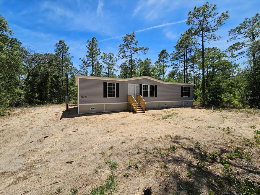BRAND NEW ON 1.25 ACRES – MOVE-IN READY! Welcome to your dream home! This never-lived-in 3 bedroom, 2 bathroom manufactured home sits on a spacious 1.25 acre lot, offering the perfect blend of modern comfort and peaceful country living.

Step inside to an open-concept floor plan filled with natural light, highlighted by energy-efficient double-pane windows and stylish recessed lighting throughout. Durable vinyl flooring flows seamlessly through every room, making maintenance a breeze, while walk-in closets in all bedrooms provide generous storage. A dedicated laundry room adds everyday convenience.

Enjoy peace of mind with a brand new 4" well and septic system already in place. With no HOA and located outside of a flood zone, you’ll have the flexibility and freedom to truly make this property your own. Home has been set up fully FHA compliant with solid-backed skirting. 

Whether you're looking for space to relax, entertain, or grow, this property delivers. Don’t miss your opportunity to own a brand-new home with room to roam—schedule your private showing today!