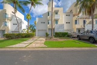 Beautifully remodeled corner unit in the exclusive Villa de Golf West community. This spacious property features 4 en-suite bedrooms, 2 balconies, and 4 terraces, offering nice golf course views. Located in Dorado del Mar, this property provides access to the beach, tennis courts, and more. Conveniently close to restaurants, the Embassy Suites hotel, Dorado Academy, shopping malls, supermarkets and the new hospital. This home perfectly blends modern elegance with resort-style living.