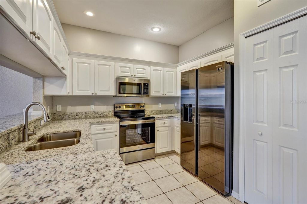 Photo of 12042 Lake Allen Drive, Largo, FL 33773 (MLS # TB8480988)