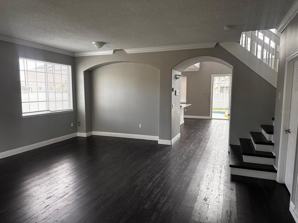 Photo of 1735 White Heron Bay Circle, Orlando, FL 32824 (MLS # O6408928)