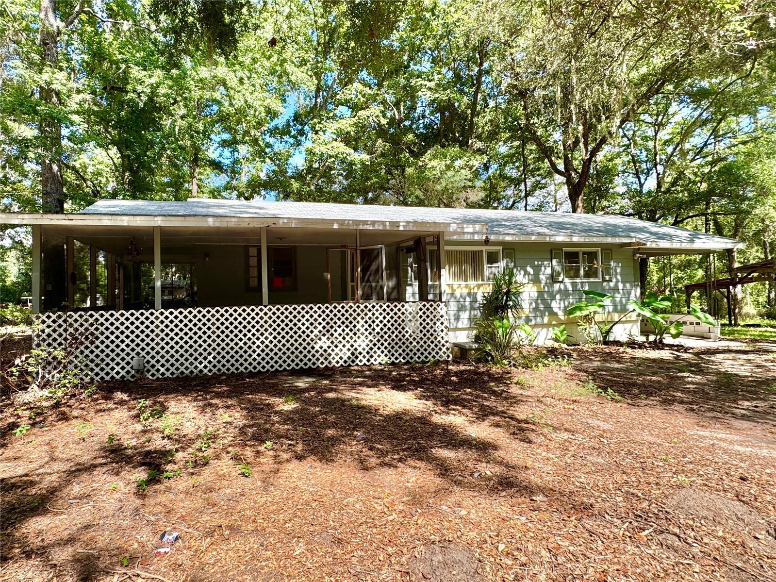Handyman special or flip opportunity! This 3-bedroom, 2-bathroom home sits on just over 5 acres of peaceful countryside and offers incredible potential for investors or renovators. The property features a fenced-in yard with a gate, perfect for pets or added privacy. You'll also find a pole barn—ideal for equipment or livestock—and a solid block barn that can be used for feed storage or converted into a workshop. The home needs work but offers plenty of space and flexibility to bring your vision to life. With some TLC, this could be a profitable investment or personalized rural retreat. Don’t miss out on this opportunity!