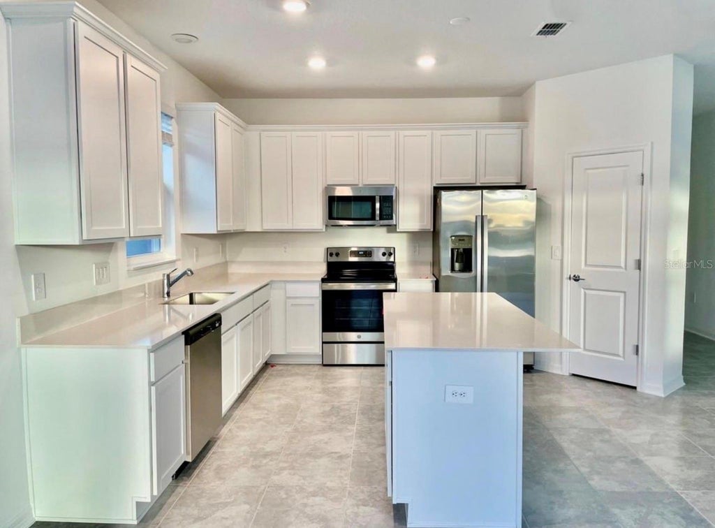 Photo of 4033 Ambrose Avenue, Kissimmee, FL 34746 (MLS # G5117786)