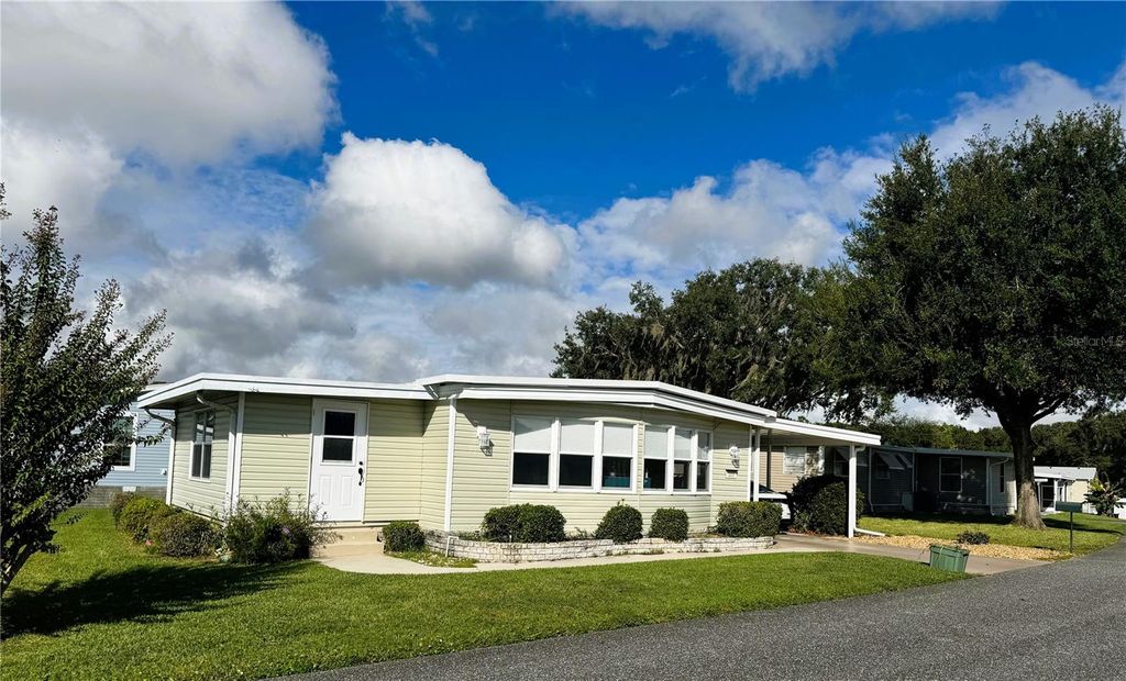 Photo of 110 Gardenia Way, Leesburg, FL 34748 (MLS # R4910059)