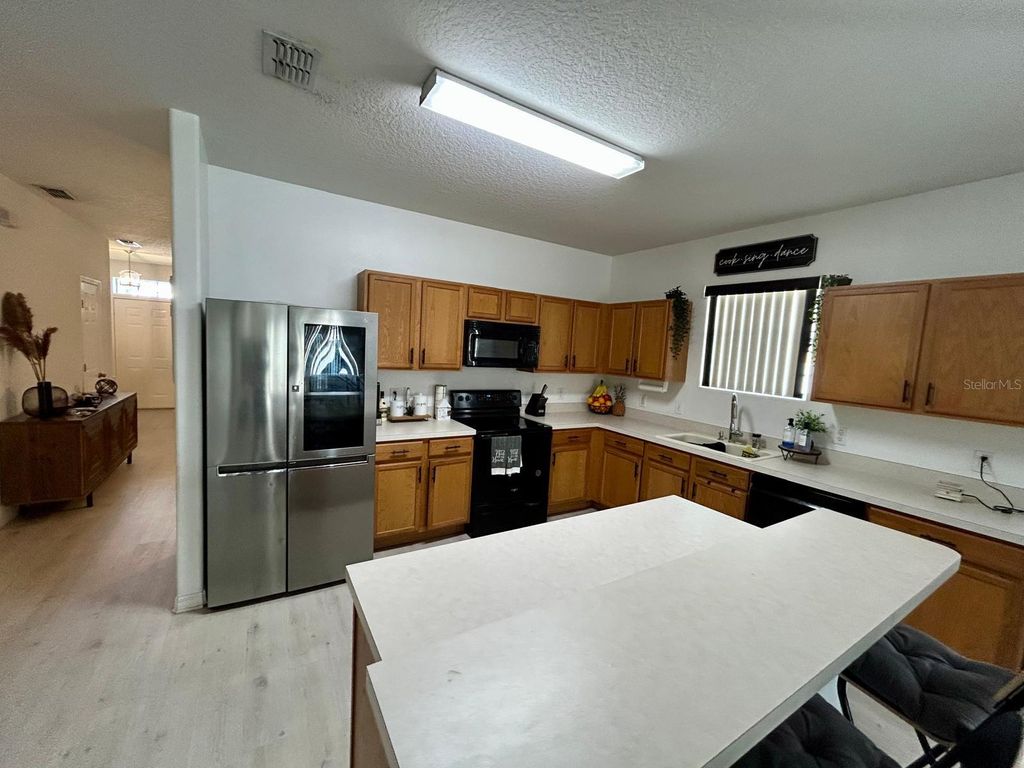 Photo of 347 Cotswold Circle, Davenport, FL 33837 (MLS # O6386435)