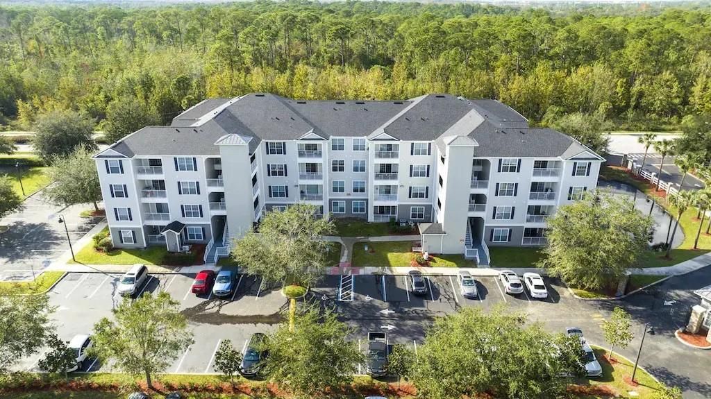 Photo of 3176 Feltrim Place #101, Kissimmee, FL 34747 (MLS # S5144091)