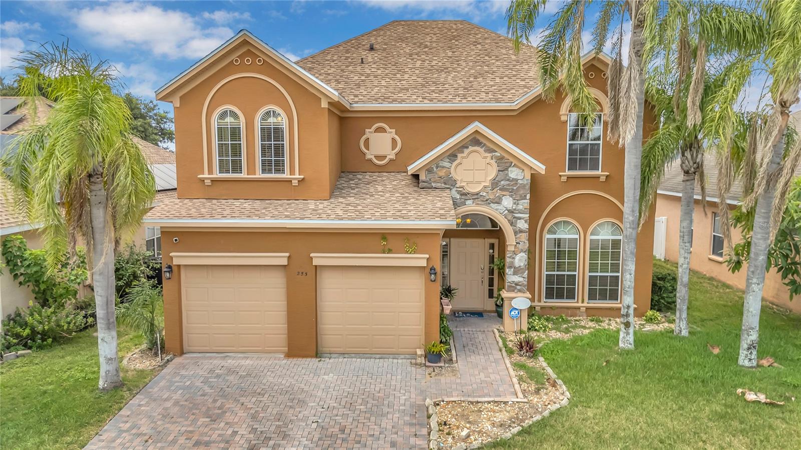 Welcome to this spacious 5-bedroom, 2.5-bathroom home at 255 Tower View Dr W in Haines City, Florida. This well-designed 2,259 square foot house offers comfortable living with an open floor plan that's perfect for everyday life and entertaining guests.
Step inside to discover high ceilings that create an airy feel throughout the home. The main living areas feature durable tile flooring, while the bedrooms are carpeted for comfort. The open layout connects the living spaces, making it easy to spend time with family and friends.
All five bedrooms provide plenty of space for a growing family or home office needs. The two full bathrooms serve the home well, and the entire property is move-in ready so you can start enjoying your new space right away.
Outside, you'll find a fenced yard that offers privacy and security, plus a paver driveway that adds curb appeal. The location is hard to beat – you're conveniently close to shopping centers, restaurants, and major roads for easy commuting. Theme park lovers will appreciate the proximity to popular attractions, and the airport is easily accessible for travel.
This home combines comfort, convenience, and practical features in a desirable Haines City location. The thoughtful layout and quality finishes make it an excellent choice for buyers looking for a well-maintained property in a great area. Don't miss the opportunity to see everything this home has to offer.