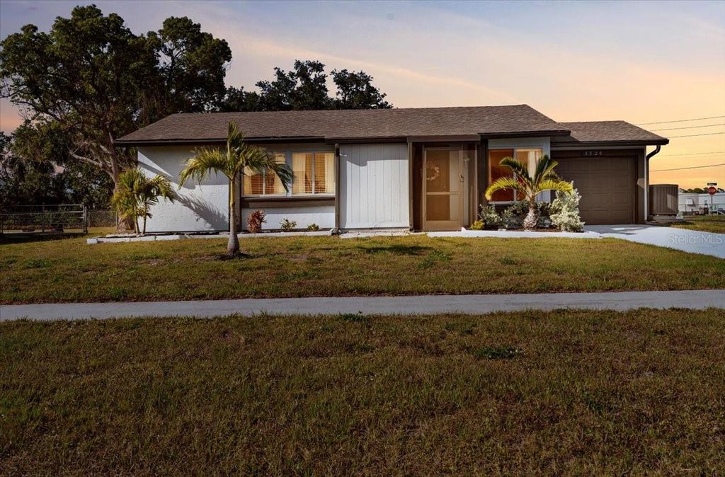 Photo of 5520 Kenwood Drive, North Port, FL 34287 (MLS # C7509081)