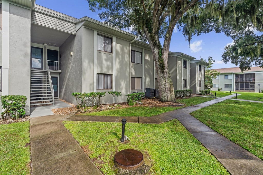 Photo of 310 Palm Coast Pkwy NE Unit 204 Pkwy, Palm Coast, FL 32137 (MLS # FC321571)