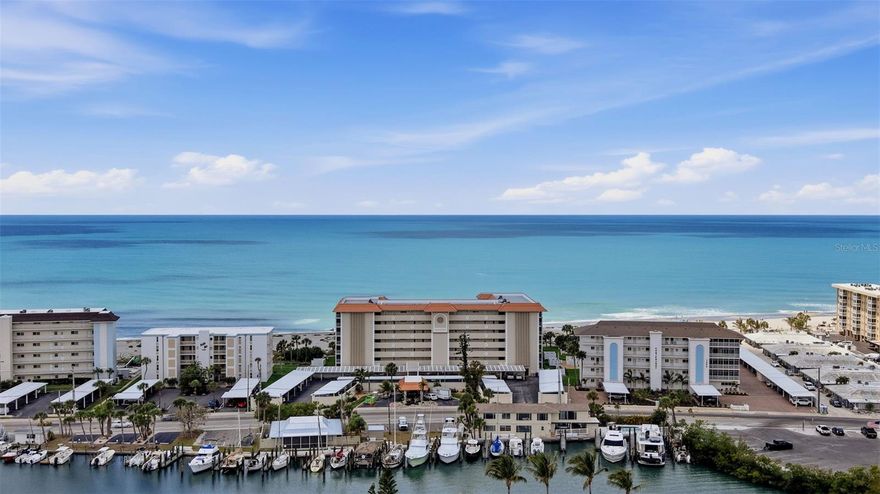 Third-floor condo with exceptional views in both directions—western exposure overlooking the Gulf with spectacular sunsets, and eastern exposure from the kitchen and front door capturing sunrises over the Intracoastal Waterway. Neutral interior colors keep the focus on the scenery. Kitchen and bathrooms have been updated with granite countertops and newer appliances. A brand-new air-conditioning system provides added efficiency and comfort. There is abundant storage, including walk-in closets in both spacious bedrooms. Laundry is conveniently located in the guest bathroom. Bedroom carpeting can be easily replaced to suit your preferences. You’ll also have your own private storage space on the third floor (elevator access!), perfect for beach gear or bikes. This lightly used seasonal residence, offering an extraordinary coastal experience, is truly a rare opportunity. Turnkey furnished even including items like TP and cleaning supplies! The Towers is a small, friendly 62-unit community where neighbors actually know each other. Monthly gatherings in the community room make it easy to connect — or you can simply enjoy the peacefulness of beachfront living if that’s more your style. Kayak and bike storage, a community grill, and 2 pet-friendly policies (for owners) add to the ease of living here. Even floors have free laundry available. Rentals are allowed with a 3-month minimum once per year, giving you flexibility whether you want a full-time home, a seasonal escape, or an investment property. And THEN there’s the location — truly unbeatable. You’re on historic Venice Island, surrounded by dining, shopping, live music, yoga on the beach, boating, pickleball, and miles of coastline to explore. The Marina and Venice Yacht Club are right across the street, and Freedom Boat Club is just a block away. This isn’t just a condo. It’s a chance to live the Gulf-coast lifestyle many dream about — morning walks on the beach, sunsets from your patio, and a community that feels like home. If you’ve been waiting for a place that blends comfort, beauty, and true beachfront living, this is the one that makes it all possible.