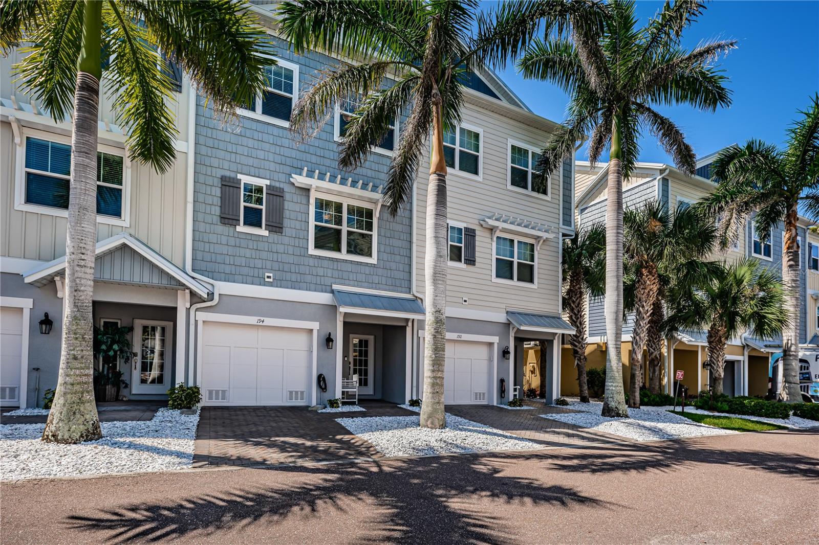 Discover Coastal Luxury at its finest in this breathtaking 4-bedroom, 3-bathroom, townhouse nestled in an exclusive gated community on famous Indian Rocks Beach. Boating enthusiasts will love the opportunity to keep your boat on the deeded slip featuring a 10,000-pound lift. Step inside this elegant residence to discover a carefully curated, turnkey home where every detail has been thoughtfully designed and appointed. The chef’s kitchen is a masterpiece, featuring custom cabinetry, stone countertops and upgraded stainless-steel appliances. The open-concept living area, adorned with full ship lap wall covering, flows effortlessly to the spacious screened in balcony showcasing picturesque Intracoastal water views. Back inside enjoy the ambiance of an electric fireplace with optional heat for those rare chilly nights. Retreat to the tranquil owner's suite, featuring a large sitting area that is the perfect spot to wind down and relax while gazing out at the water. The spa-inspired en-suite is complete with dual sinks, a generous walk-in shower, and a spacious walk-in closet. This meticulously maintained townhouse features upgraded impact windows for peace of mind and energy efficiency. Complete with the convenience of an elevator allowing easy access to all levels. The first floor features a lovely patio with access from the oversized tandem garage that has space for at least two vehicles, along with ample storage for all your toys and essentials. Completely FURNISHED and TURNKEY with upgraded features including new generator, new water heater and A/C with ultraviolet light, Samsung Frame TV's throughout and much more. Full list available upon request. Stop by for a dip in the community pool after a day at the beach or just lounge and enjoy the scenery. Embrace the Indian Rocks Beach lifestyle with sugar-sand beaches just across the street, a variety of eclectic shopping, and diverse dining to explore and enjoy.