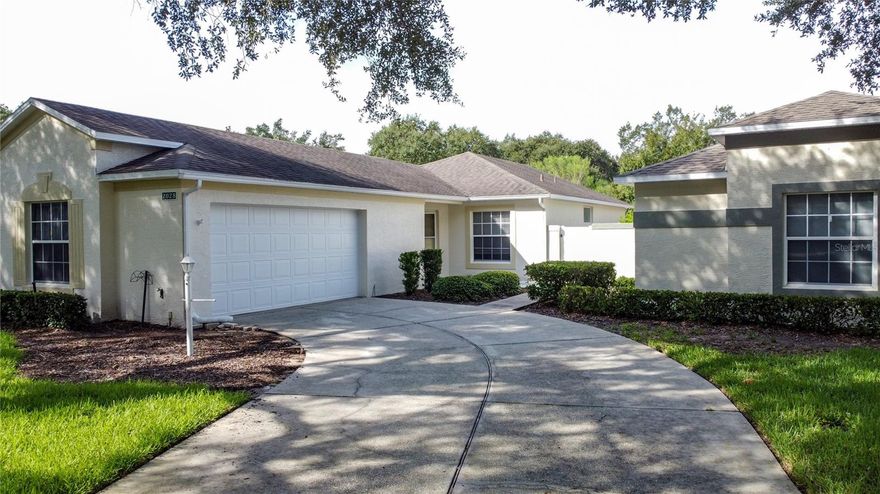 JUST REDUCE !!  Welcome to Kings Ridge Golfing Community! 24 hour guard gate. MOVE in READY. 
This home is located in the Whitehall subdivision of Kings Ridge. The York Model from The Cottage Series features 2 bedrooms, 2 baths,    2 car garage and fenced in private back yard for your pets or garden. New WATER HEATER 2025, NEW A/C 2024, ROOF 2015.  Freshly neutral color painted walls and new neutral laminate floors throughout, new light fixtures. The Eat in kitchen has a nice view of the front yard.  The vaulted ceiling enhances the large great room dining room/ living room combo. Entertain on the enclosed lanai.   Master bedroom has walk-in closet.  The spacious garage has space for 2 cars or golf cart parking.  With many residents using golf carts to access community amenities and nearby shops, this feature is a game-changer and adds incredible convenience and value.  Kings Ridge is a 24-hour guard-gated, highly sought-after 55+ active community in the beautiful hills of Clermont. The HOA fees include access to a multi-million-dollar clubhouse, 3 pools, two spas, pickleball and tennis courts, classes, clubs, bingo, movies, and more. Lawn maintenance, basic cable, and internet are all included. Hop on your golf cart for a quick trip to the local shopping center, grocery stores, banks, restaurants, doctors’ offices, hair salons, Starbucks, and more. Enjoy a relaxing day at the pool or explore nearby attractions like Disney, SeaWorld, Universal Studios, NASA’s Kennedy Space Center, world-famous shopping, or spend the day at one of Florida’s stunning beaches on either coast. Clermont is centrally located, and Orlando International Airport is only 45 minutes away. Come live the good life at Kings Ridge and discover what you’ve been missing!