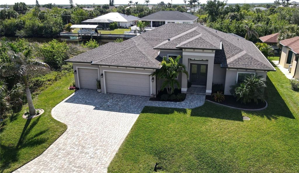 Photo of 17350 Bayharbor Circle, Port Charlotte, FL 33948 (MLS # C7520203)