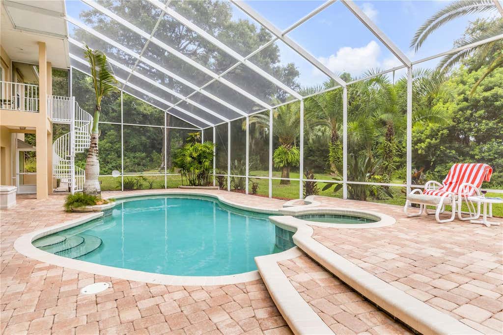 Photo of 5842 Spruce Creek Woods Drive, Port Orange, FL 32127 (MLS # NS1088657)