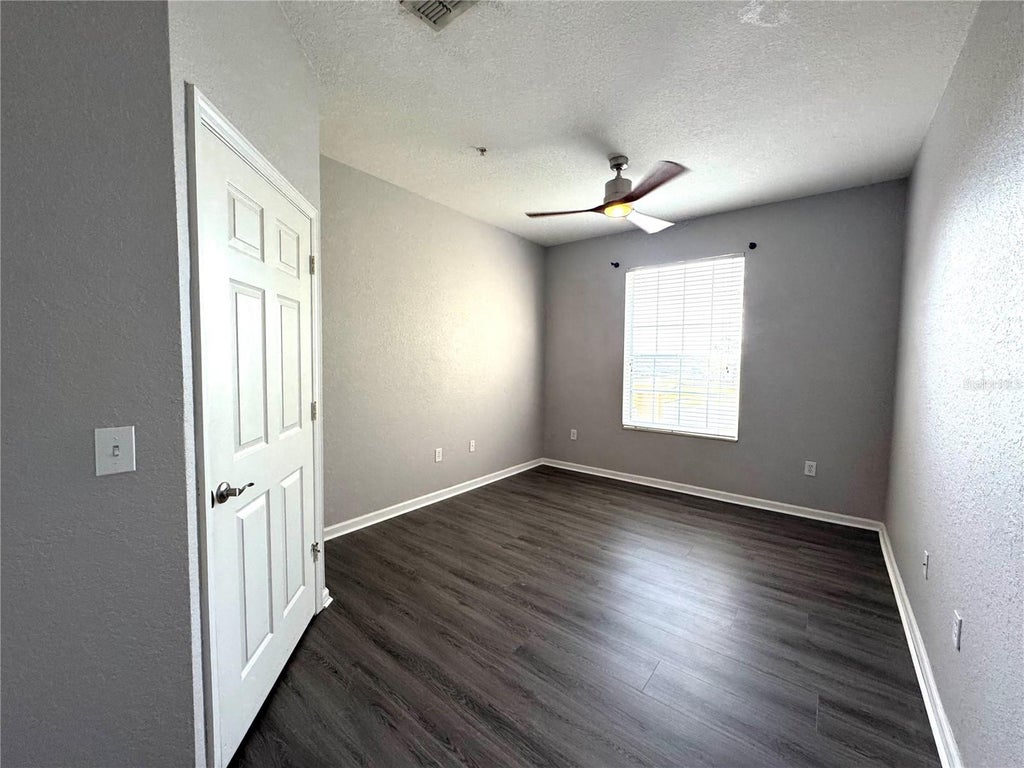 Photo of 8660 Buccilli Drive #305, Orlando, FL 32829 (MLS # S5156331)