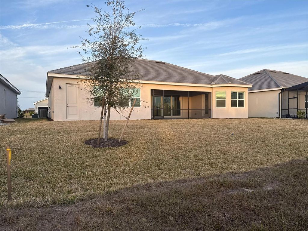 Photo of 7796 Lakes Edge Lane, Port Charlotte, FL 33981 (MLS # C7520354)