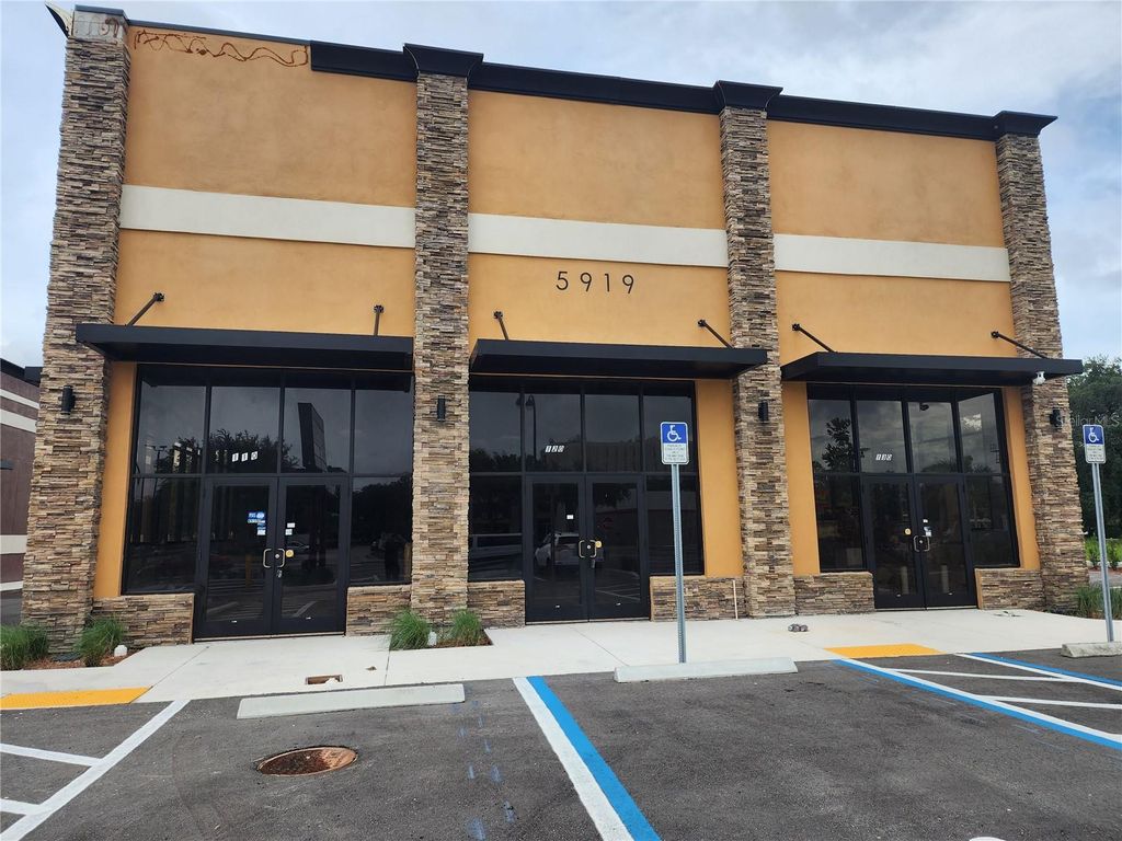 Photo of 5919 S Orange Blossom Trl #110, Orlando, FL 32809 (MLS # O6385888)